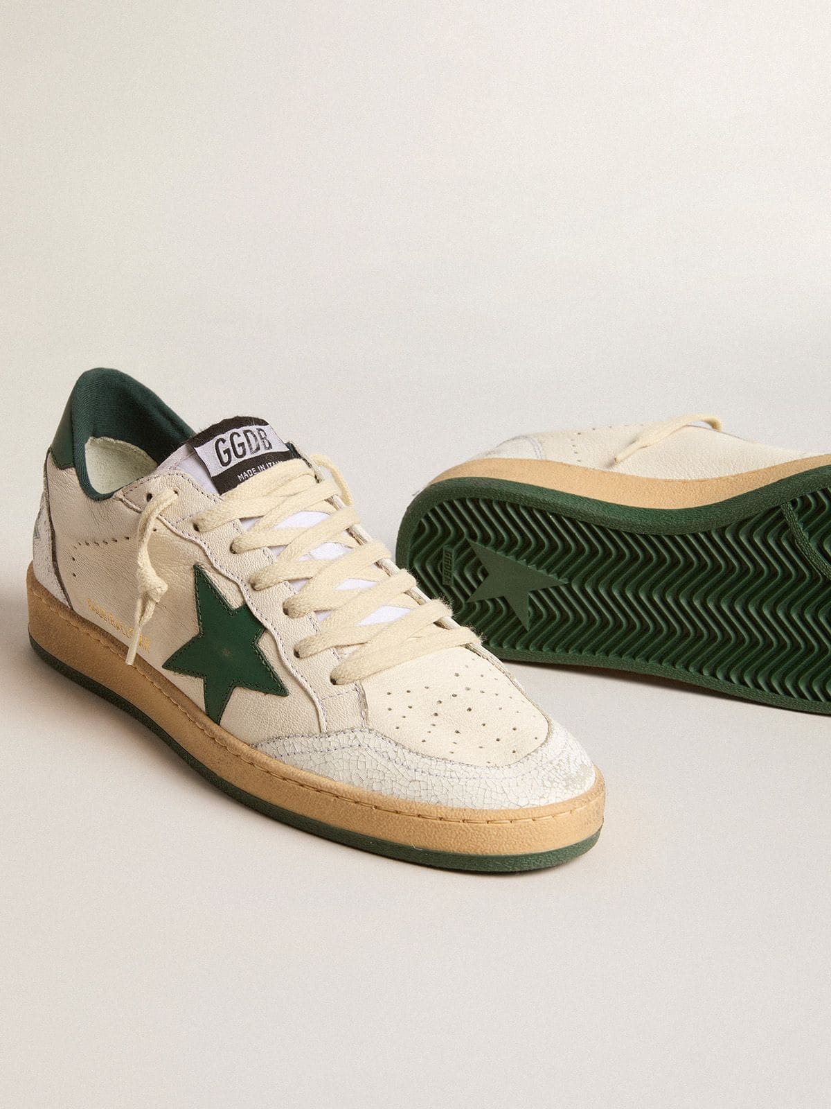 Golden Goose Men's Ball Star Wishes in white nappa leather with green leather star and heel tab