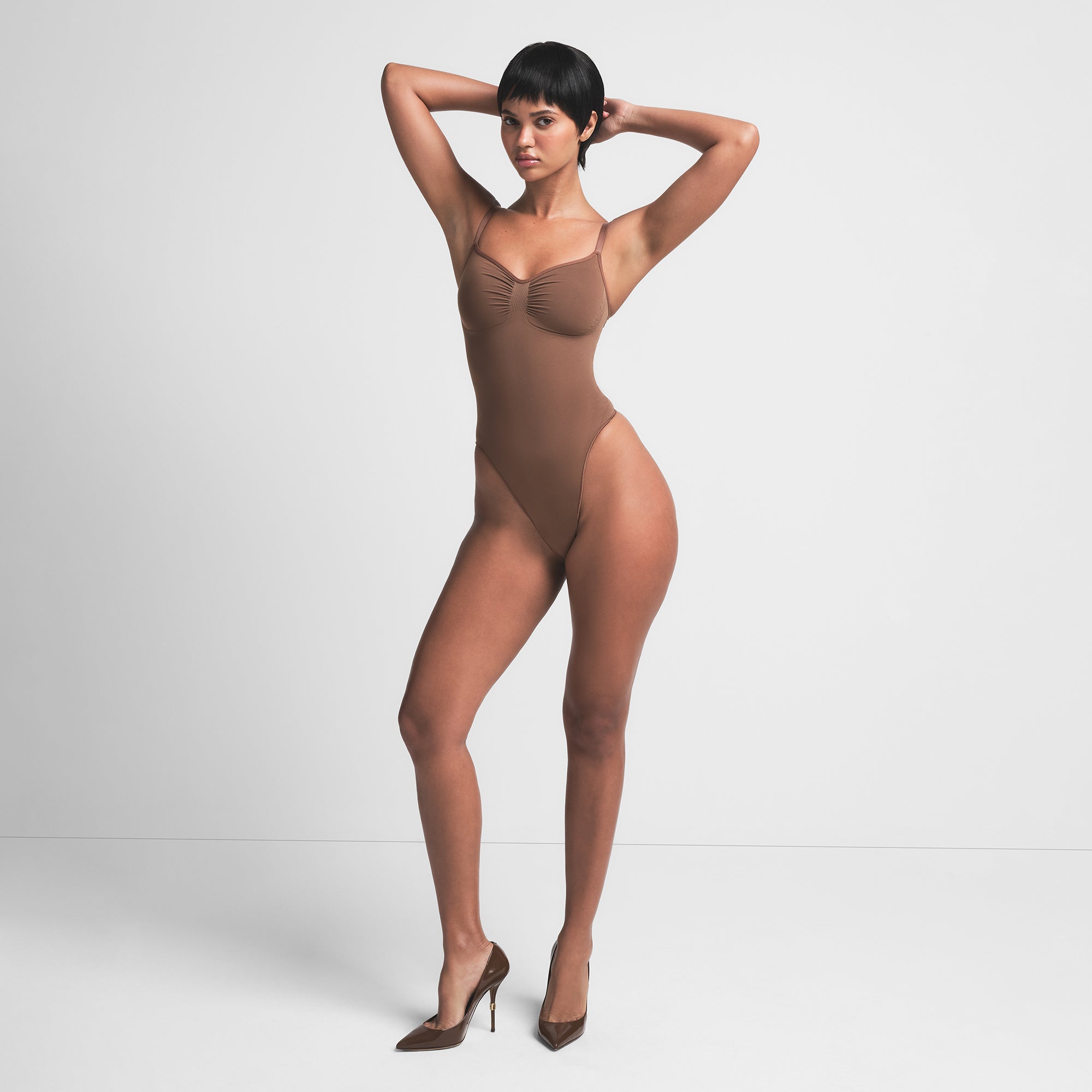 SKIMS SEAMLESS SCULPT THONG BODYSUIT | JASPER