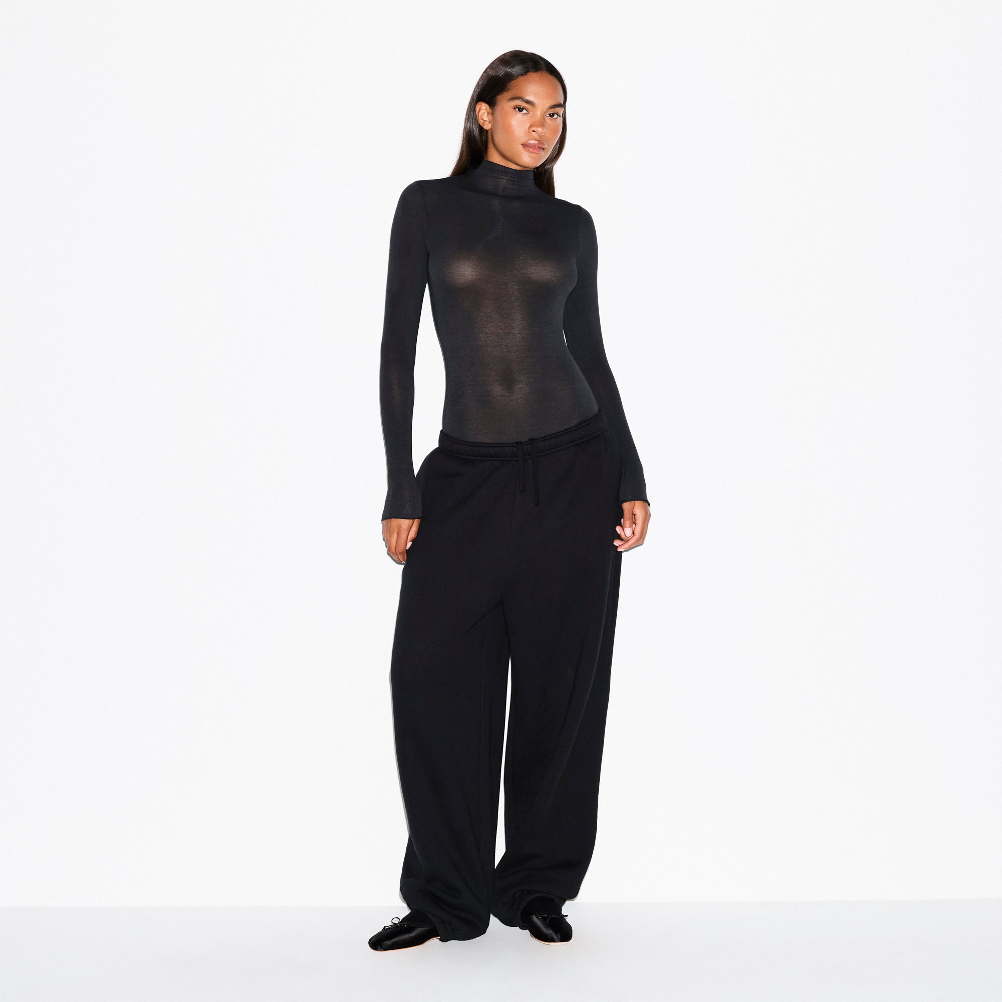 SKIMS SHEER MODAL LONG SLEEVE TURTLENECK BODYSUIT | ONYX