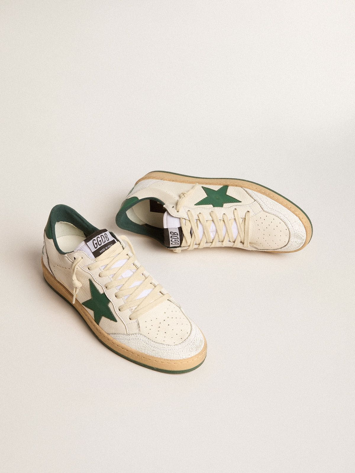 Golden Goose Men's Ball Star Wishes in white nappa leather with green leather star and heel tab
