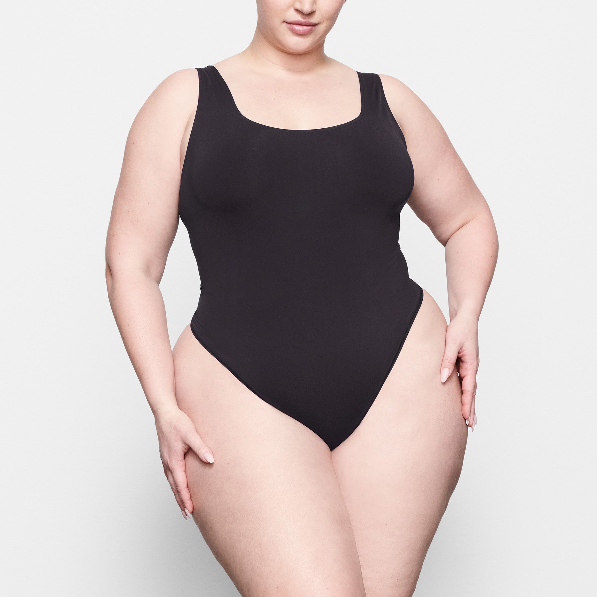 SKIMS SOFT SMOOTHING SEAMLESS THONG BODYSUIT | ONYX