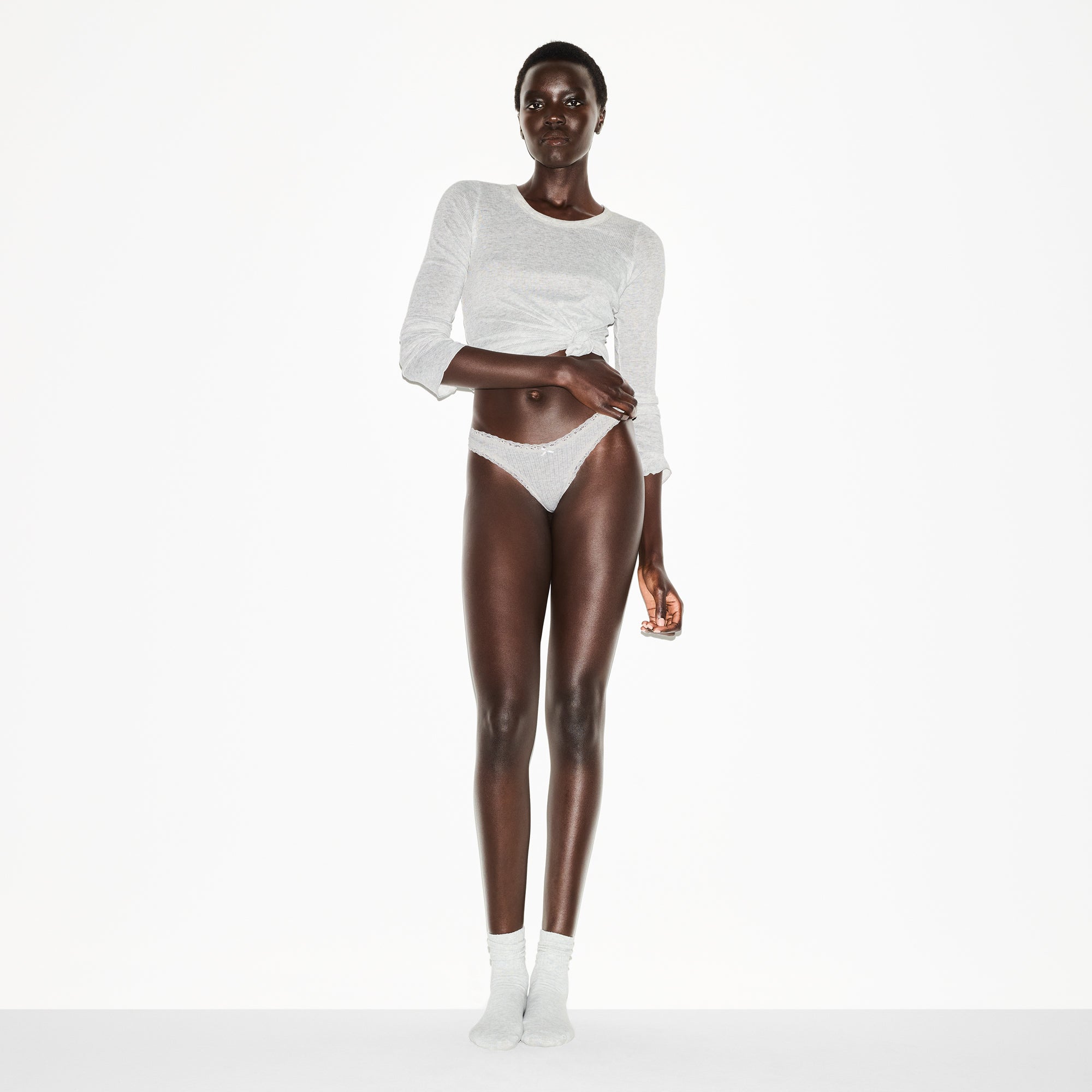 SKIMS LIGHTWEIGHT COTTON POINTELLE LACE THONG | LIGHT HEATHER GREY